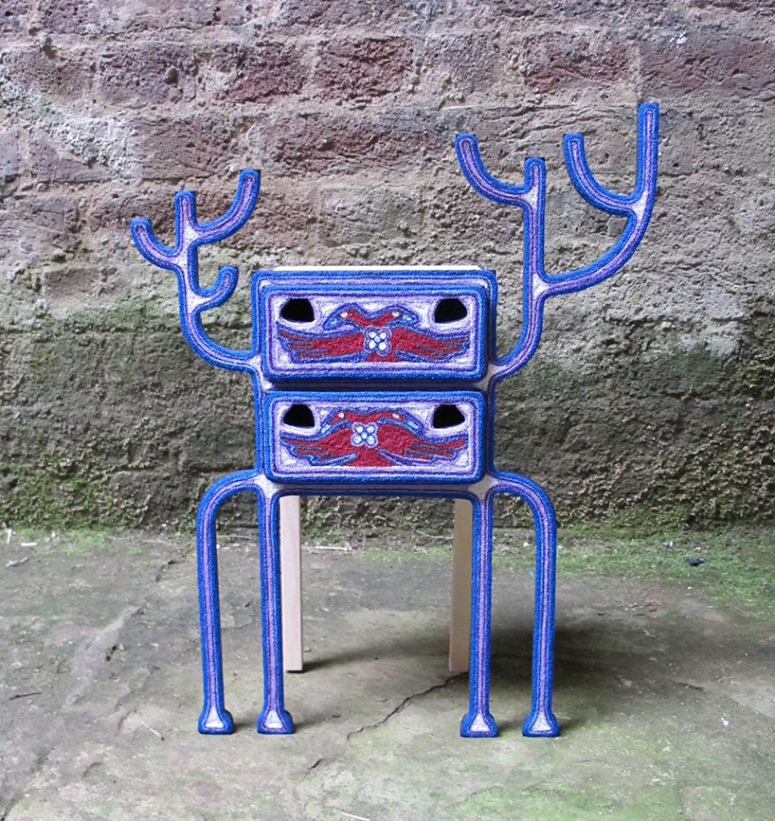 The Maxa jewelry box in bold blue and red looks alien-like
