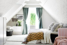 05 The master bedroom is an attic space, which is a great calming backdrop for bold and printed fabrics