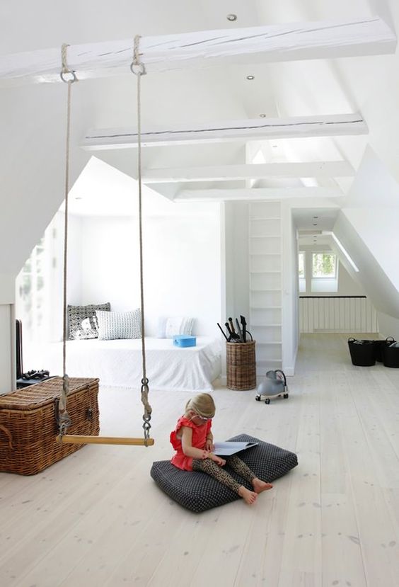 a swing can serve an additional space divider in a kid's room