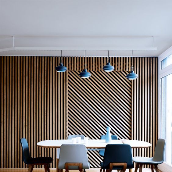 wood planks clad in a geometric pattern create bold decor and make the space cool