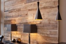 06 a reclaimed wood wall contrasts modern furniture and fixtures