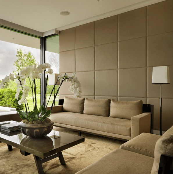leather wall panels make the space look very chic and reduce the noise level