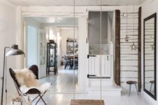 10 a Scandinavian living room with a swing as a focal point to make it dreamy and relaxing