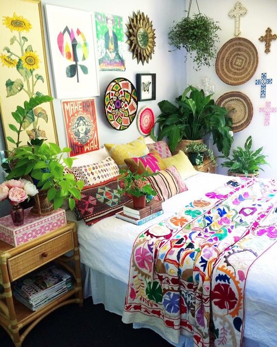 colorful printed pillow cases and a blanket in bold shades