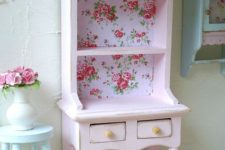 11 open white cupboard with floral wallpaper inside for a cute shabby chic look