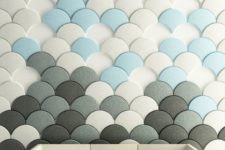 12 scallop acoustic penals in white, grey and blue create an interesting wall art