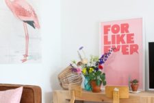 13 an oversized flamingo poster is easy to DIY and will easily add a tropical flavor