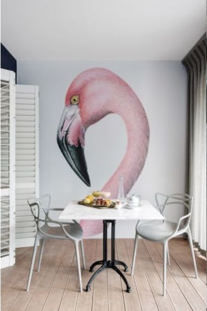 oversized pink flamingo wall mural to make a simple dining space eye-catchy