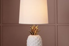 16 ceramic pineapple table lamp with a neutral lampshade
