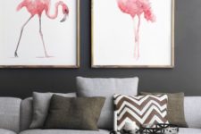 18 pink watercolor flamingo wall art pieces add color to this monochrome grey space
