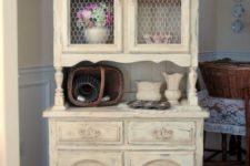 19 shabby chic buttermilk cupboard with chicken wire on the former glass compartments