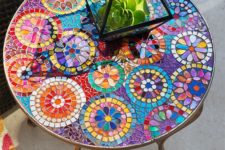 20 colorful mosaic table with a floral pattern for a bold boho space