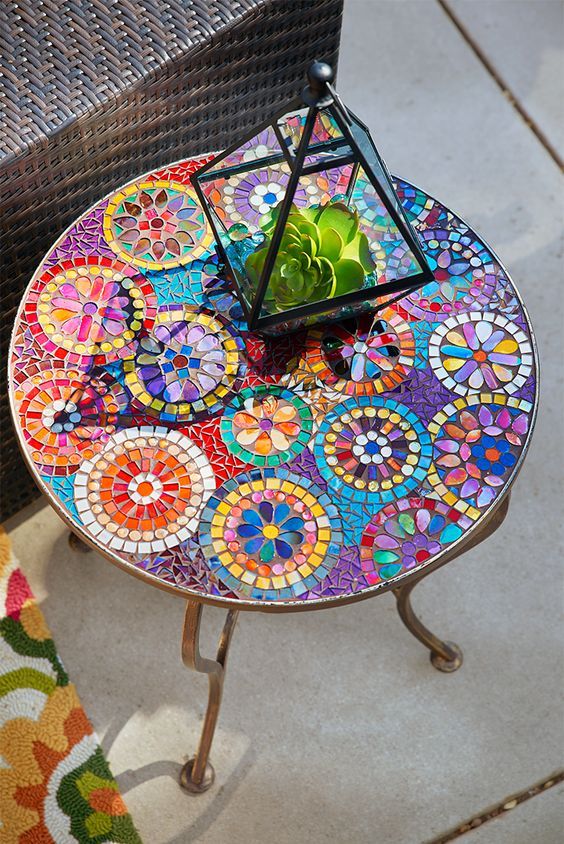 colorful mosaic table with a floral pattern for a bold boho space