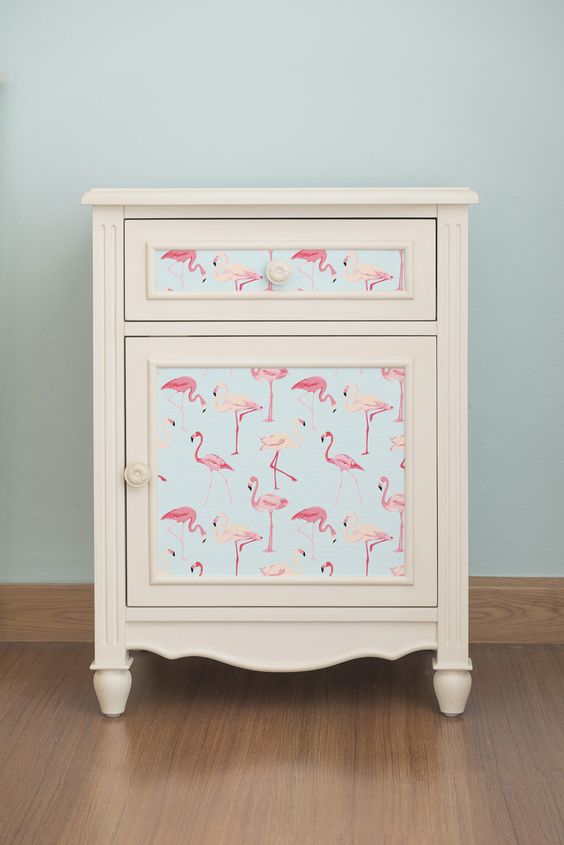 self adhesive, removable wallpaper with a pink flamingo print will change your nightstand