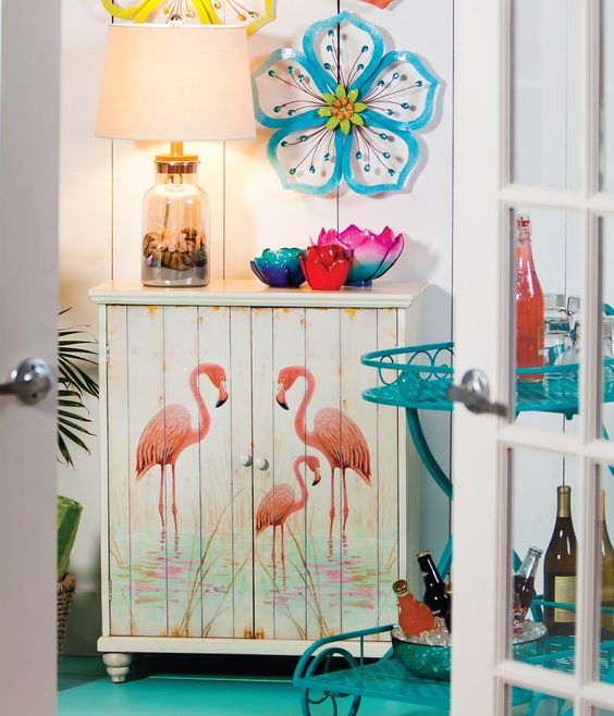 a small cabinet with pink flamingoes will add a whimsy touch