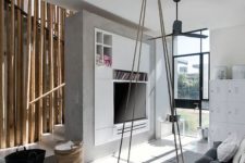 22 modern industrial living space with a cozy rustic swing as a storage unit