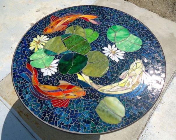 Koi stained glass mosaic table for a zen inspired outdoor space