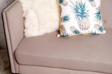 24 a woven pillow featuring an allover pineapple print, a contrast trim
