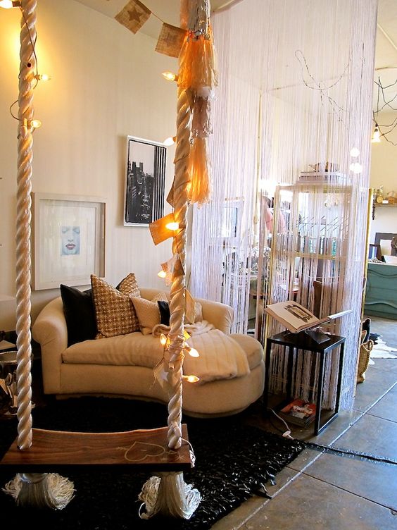 decorate your swing with banners and string lights to make it more inviting