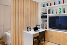 25 a vertical wooden partition is a warm and stylish solution for dividing the space