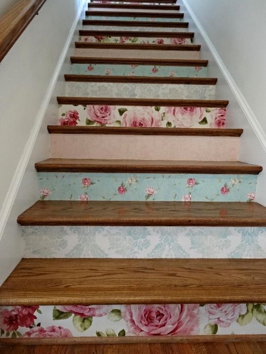 different floral wallpaper to accentuate the stairs and add a vintage feel