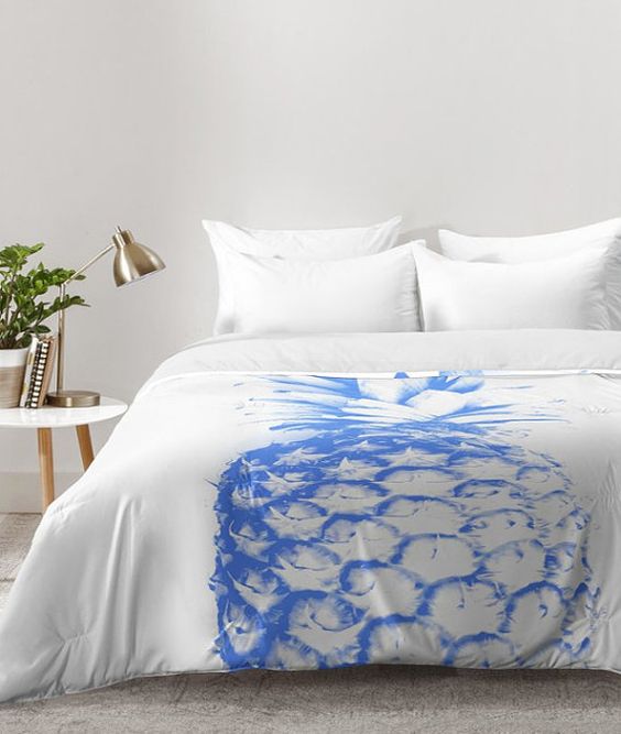 modern blue pineapple print on your duvet will remind of holidays