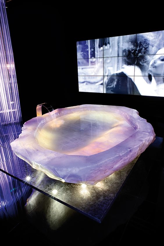 a rock crystal bathtub will turn your bath time into relaxing spa experience