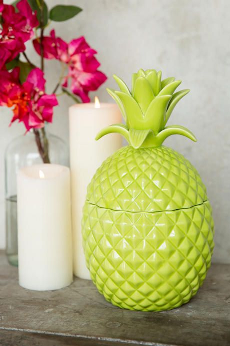 a green pineapple jar can be used for jewelry storage or other stuff