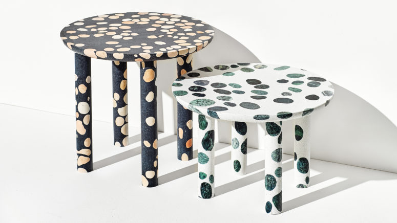 White and black terrazzo tables with green and beige inserts