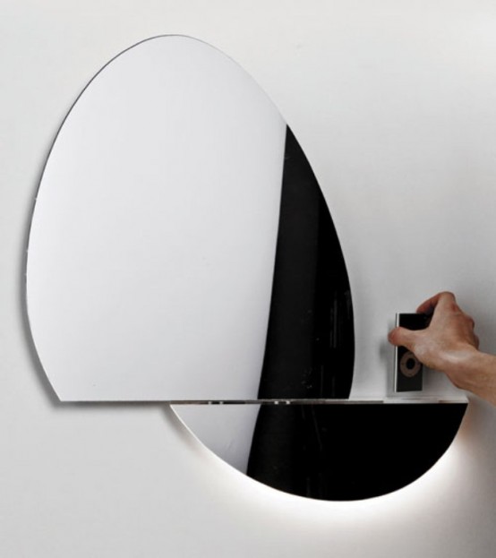 Open Mirror with iPhone and iPod dock (via www.digsdigs.com)