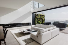 01 This all-white house is an amazing minimalist space with laconic interiors and a luxurious touch