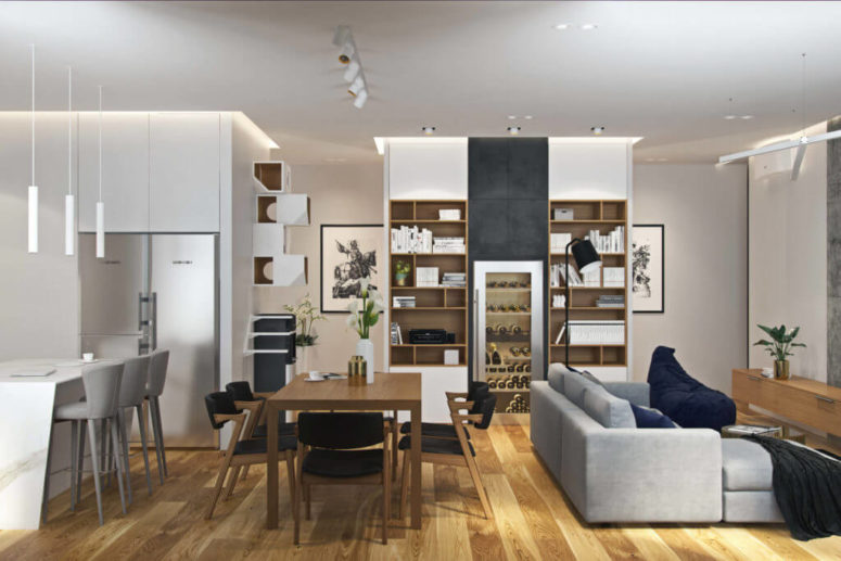 The living room, dining room and the kitchen are united into one big open layout, with a wide use of nautral wood and different shades of grey