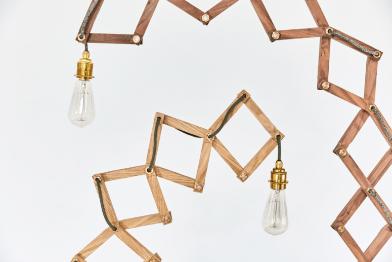 The scissor sctructure is made of wood, and is crowned with a cute bulb - nothing excessive is here