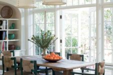 02 a coastal dining room with a rough wooden trestle dining table that adds texture and style