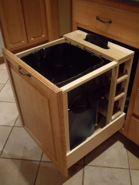 a large pull out drawer with a trash can is ideal for any kitchen, choose the most comfortable one
