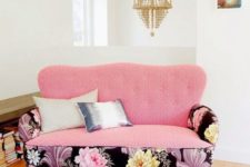 02 a loveseat with mixed upholstery in geo pink and large blooms in the black backdrop adds a glam touch