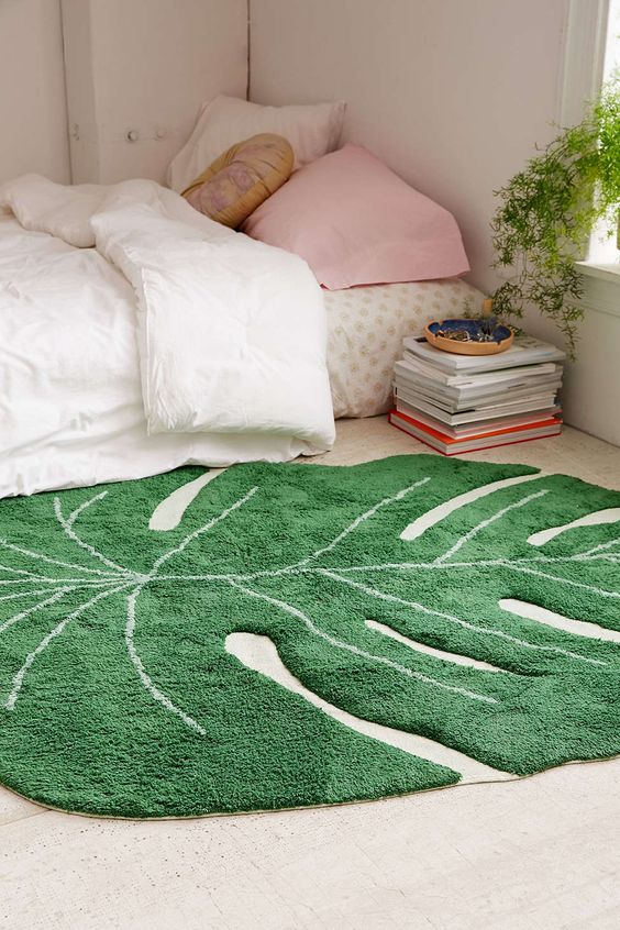 a monstera leaf rug won't cost much but will add a cool cheery feel