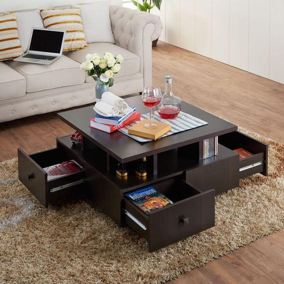 a coffee table with open shelving and drawers will save much space
