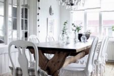 04 a white shabby chic dining space with a wooden trestle table