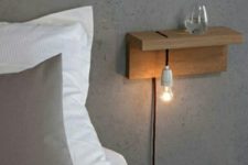 04 attach a piece of wood to the wall and add a bulb – and voila, an industrial nightstand is ready