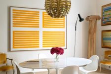 05 A decorative Greek-style pillar and refined yellow velvet chairs added an exquisite touch to the space
