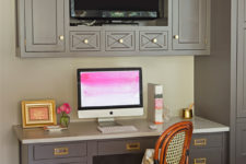 05 The home office is visually divided from the kitchen with a different shade of cabinets and more traditional design