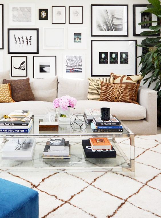 a double glass tabletop coffee table with metallic corners for a chic modern look