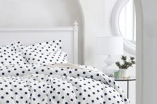 05 white and navy polka dot bedding for a girl’s space