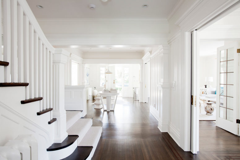 The interiors are white but dark stained floors make them contrasting and give a character