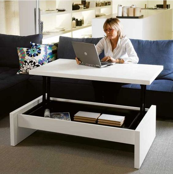 a coffee table becomes a desk - no need for a home office