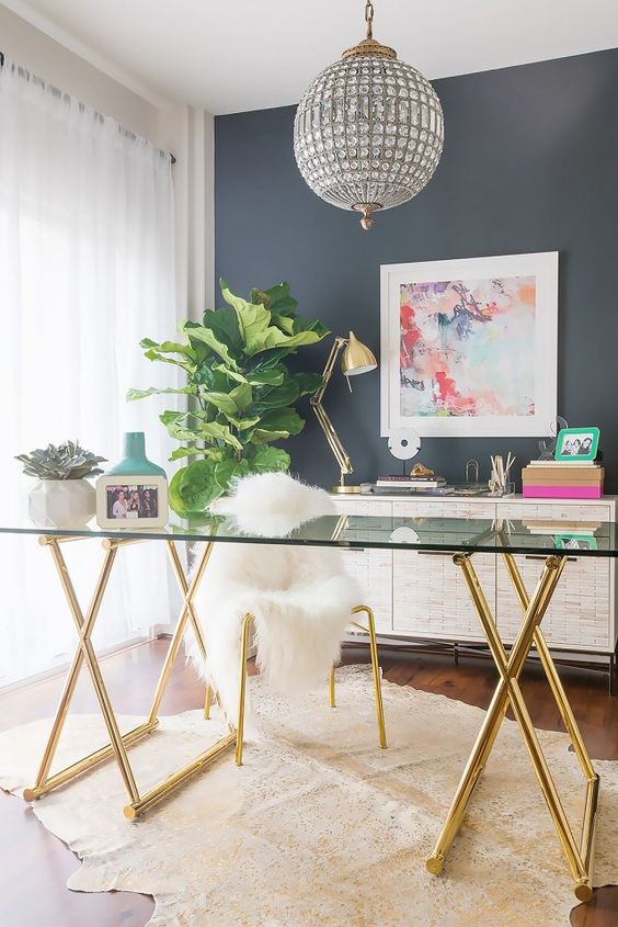 such a brass trestle leg desk with a glass tabletop will easily add a glam feel to your home office