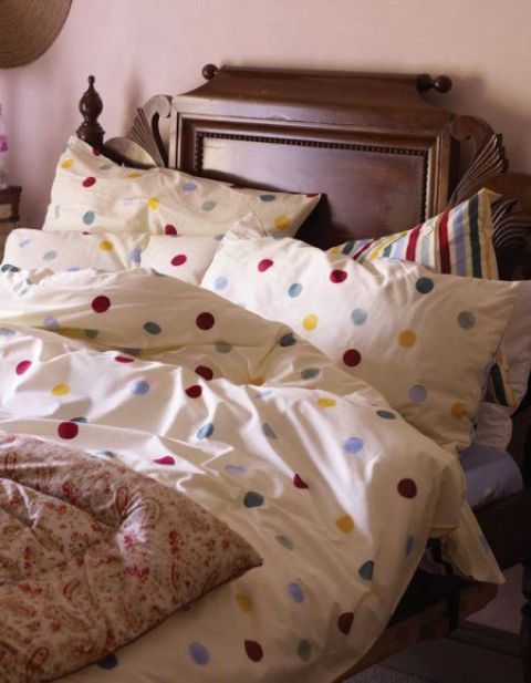 colorful polka dot printed bedding to add a cheery summer touch