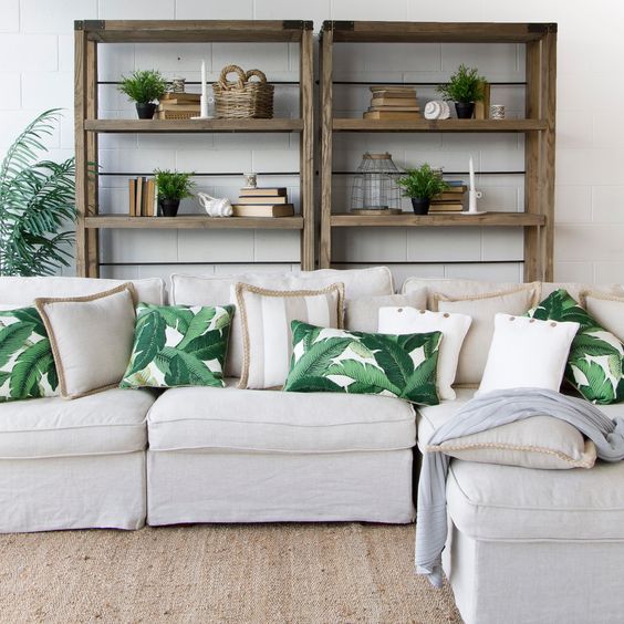 mix usual pillows and tropical print ones to add summer cheer to your living room
