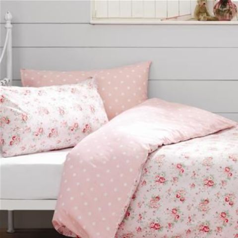 cute floral and pink and white polka dot bedding for a vintage or shabby chic bedroom
